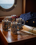 Anchor mug on a worn wooden desk