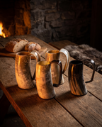 Ox horn tankard on a tavern table