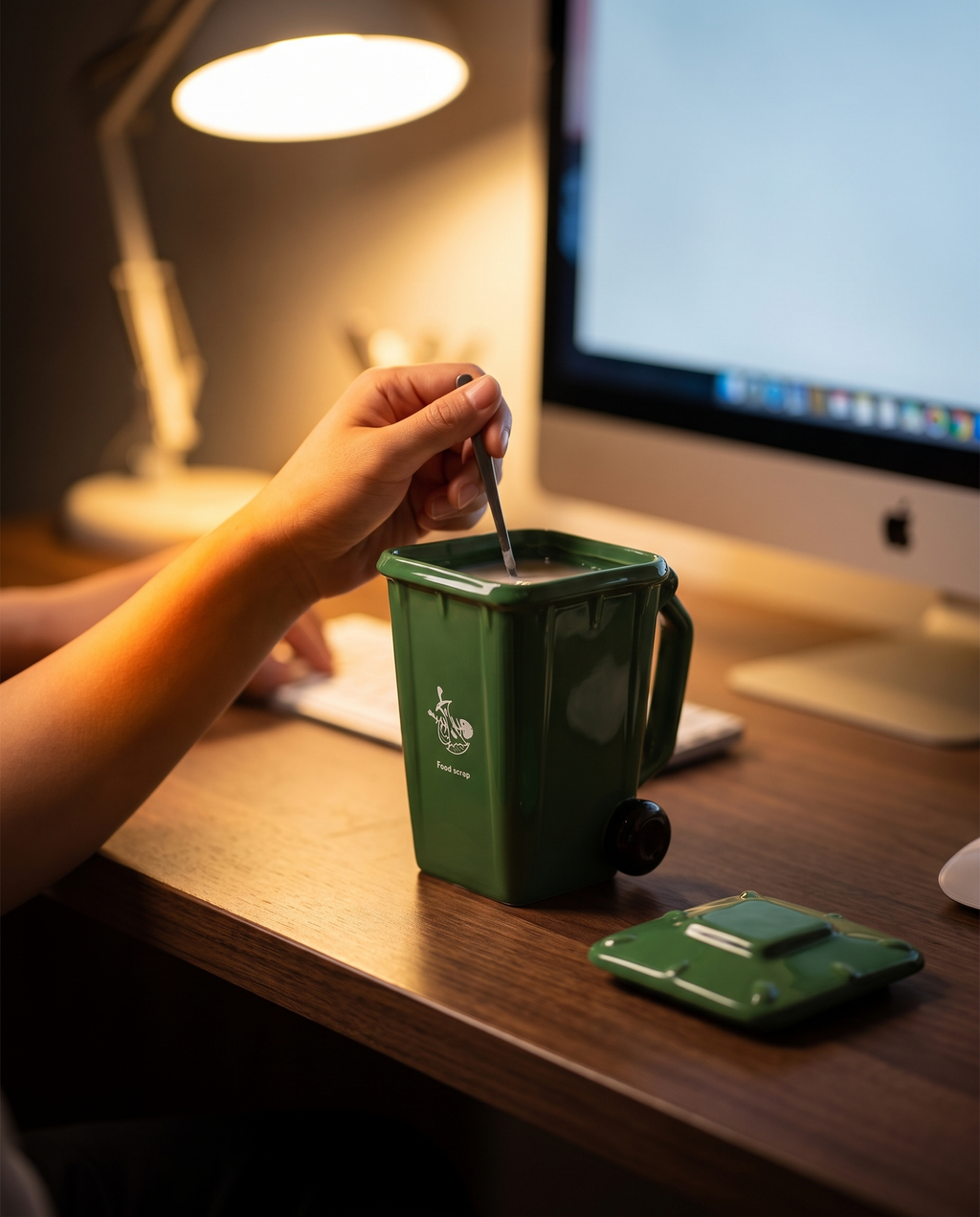 Trash can mug lifted off a desk